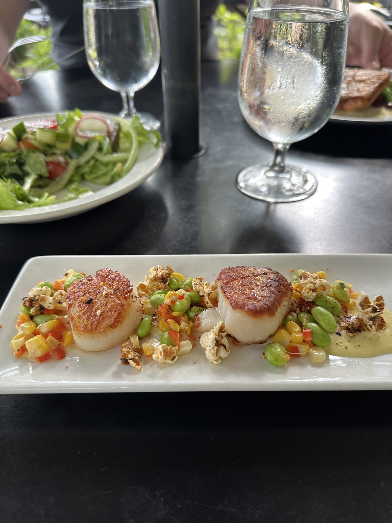 W.A. Frost and Company signature dishes Beef Wellington, Pan-Seared Scallops, Cheese & Charcuterie Boards, seasonal entrees
